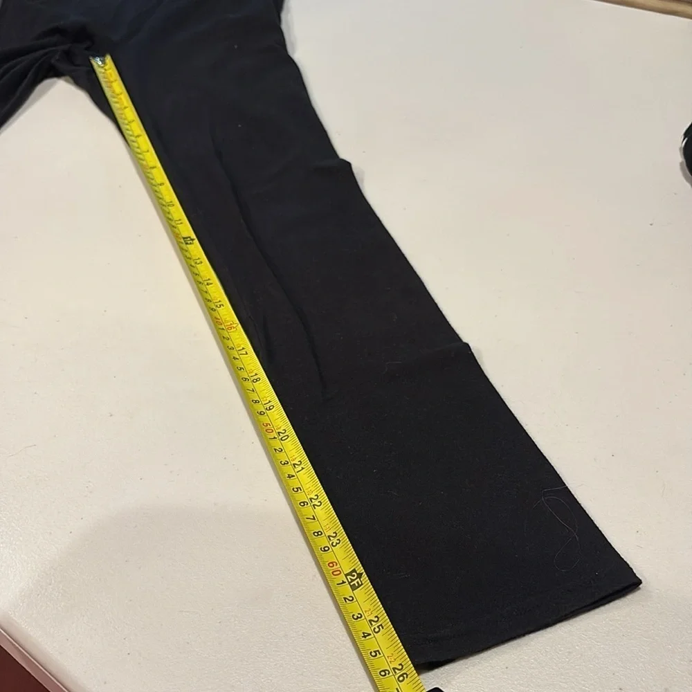 Old navy girls leggings.  size XL (14-16). Black and black with flowers